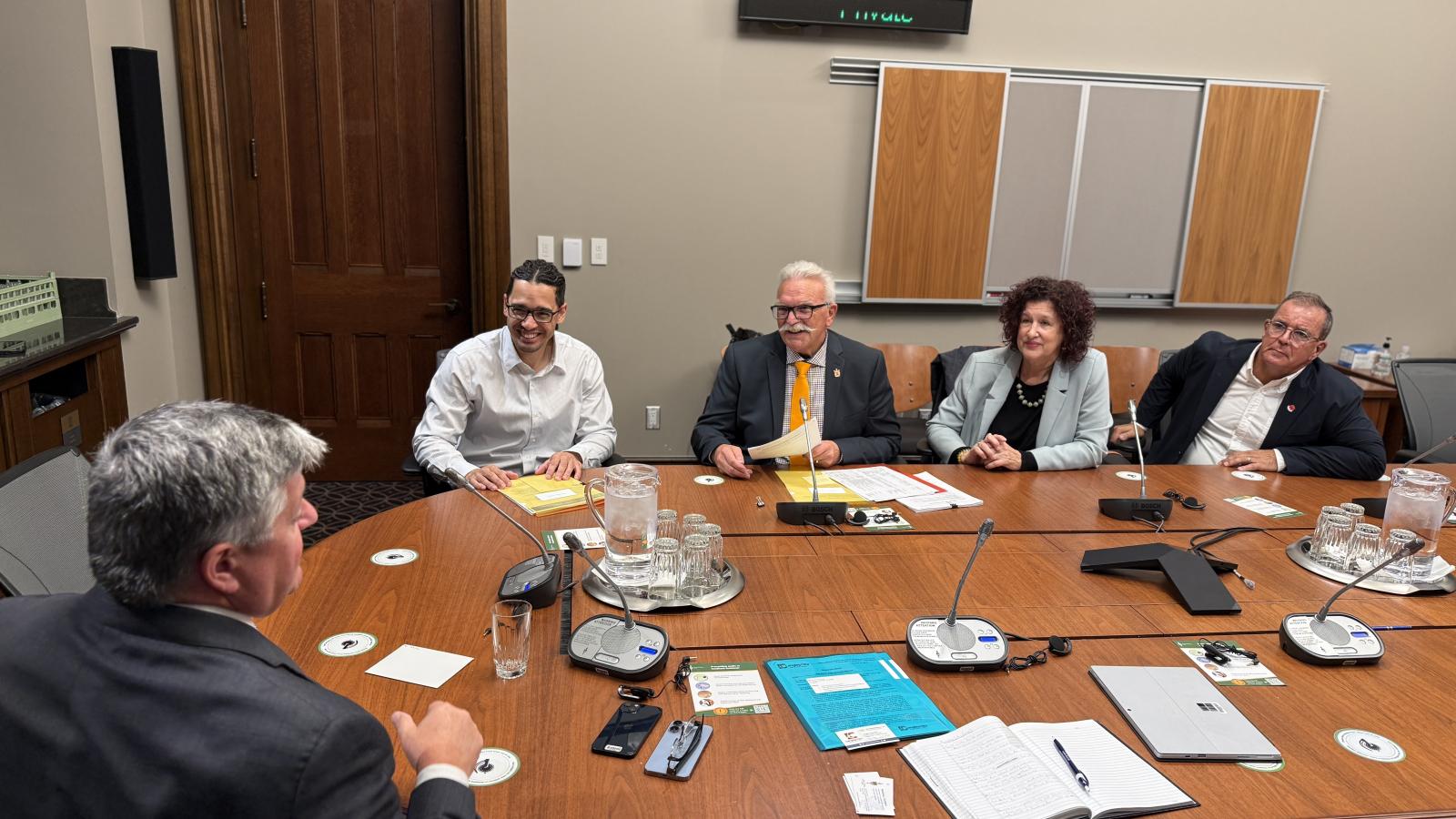Meeting with Parliamentary Secretary Scott Aitchison to discuss federal funding support to replace aging infrastructure and plan for future population growth.