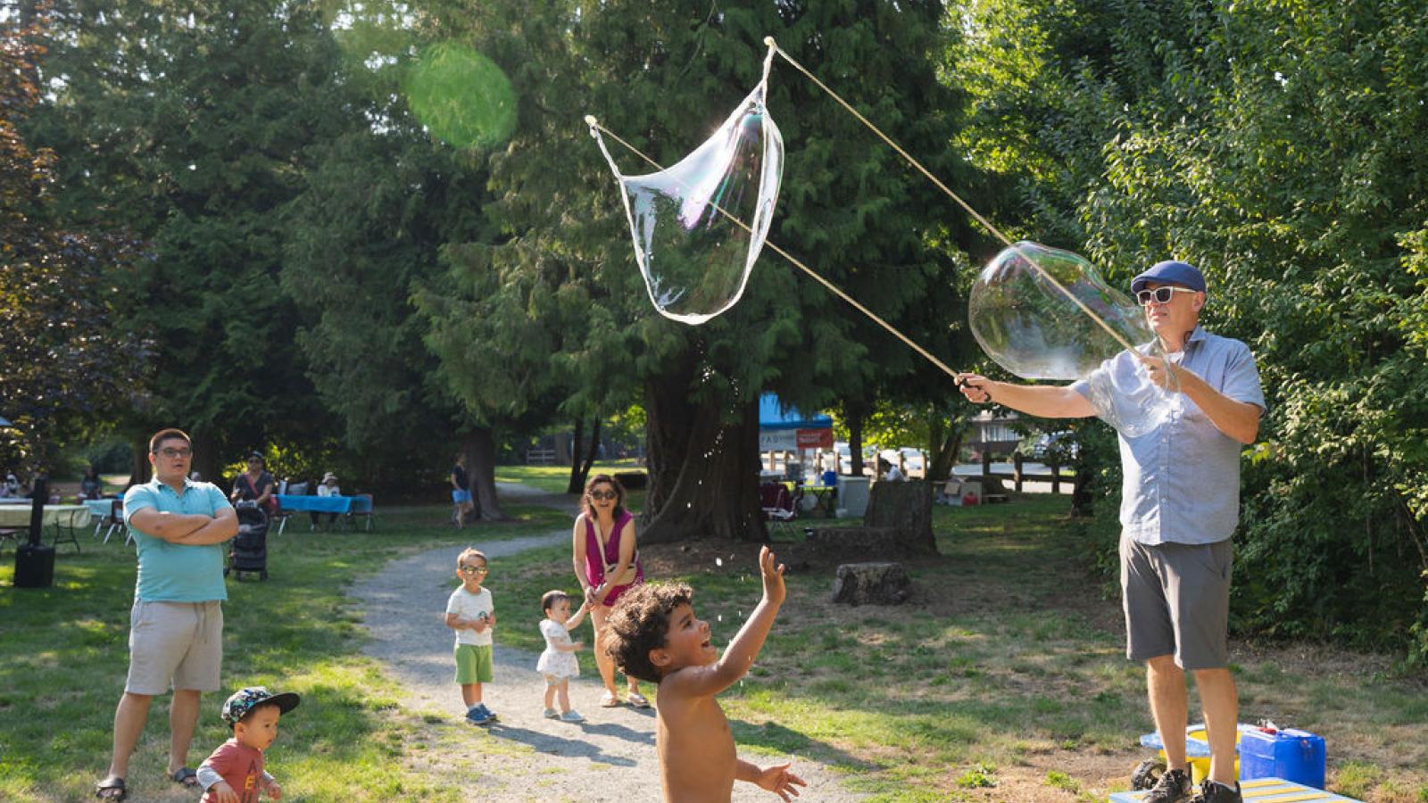 blowing bubbles at Social Streets