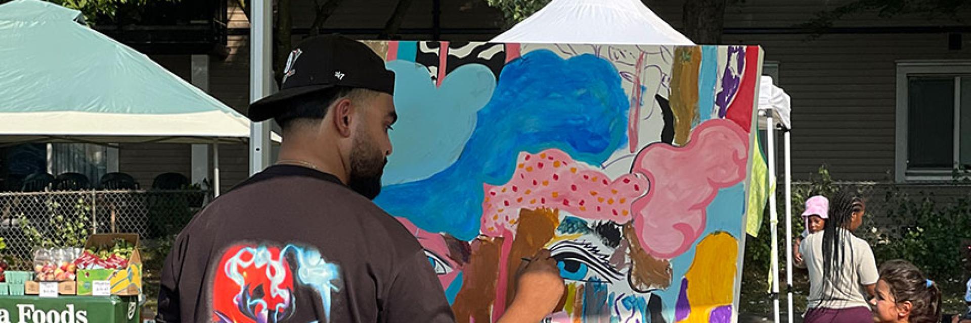 Man painting at park