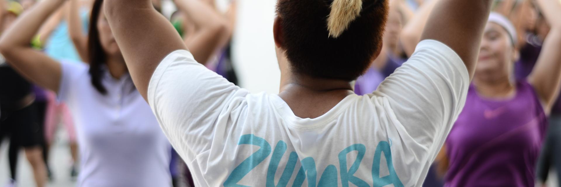 instructor teaching Zumba