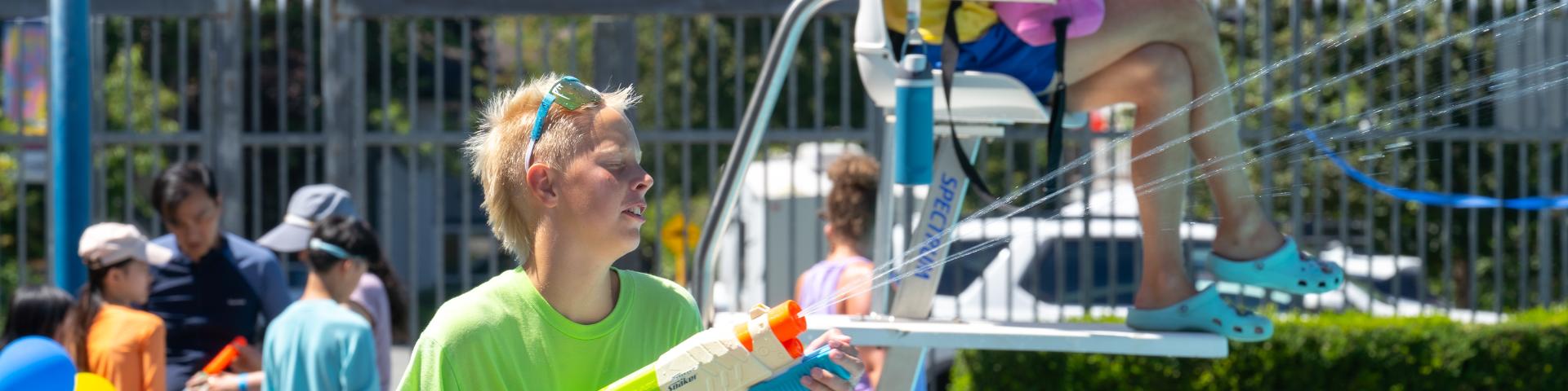 male volunteer helping at legendary waterfight