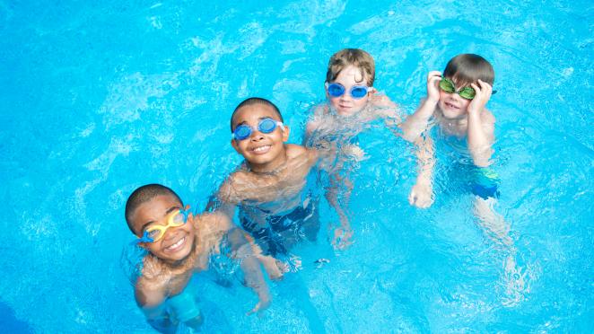 boys swimming in pool