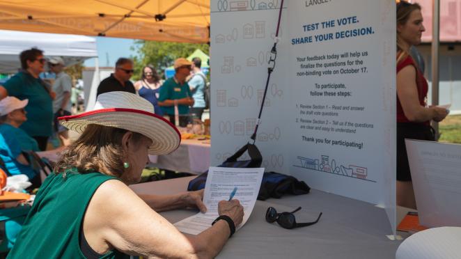 member of the public testing the poll questions for Invest Langley City