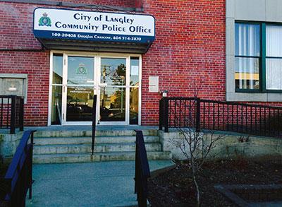 Stairs leading to brick City of Langley Community Police Office Building.